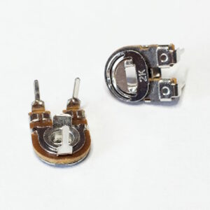 A pair of 2k trimmer potentiometers with silver-toned wipers and "2K" markings for ZX Spectrum Issue 2 repair.
