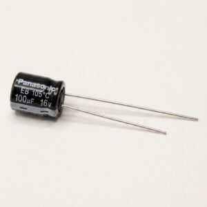 A brand-new Panasonic 100uF 16V radial electrolytic capacitor for a Sinclair ZX Spectrum composite video mod.