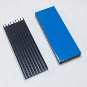 Black aluminium ULA heatsink with blue thermal tape, ready to be attached to a Sinclair ZX Spectrum ULA chip.