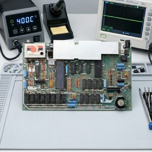 Professional Sinclair ZX Spectrum 16K/48K repair and refurbishment service being performed on a motherboard