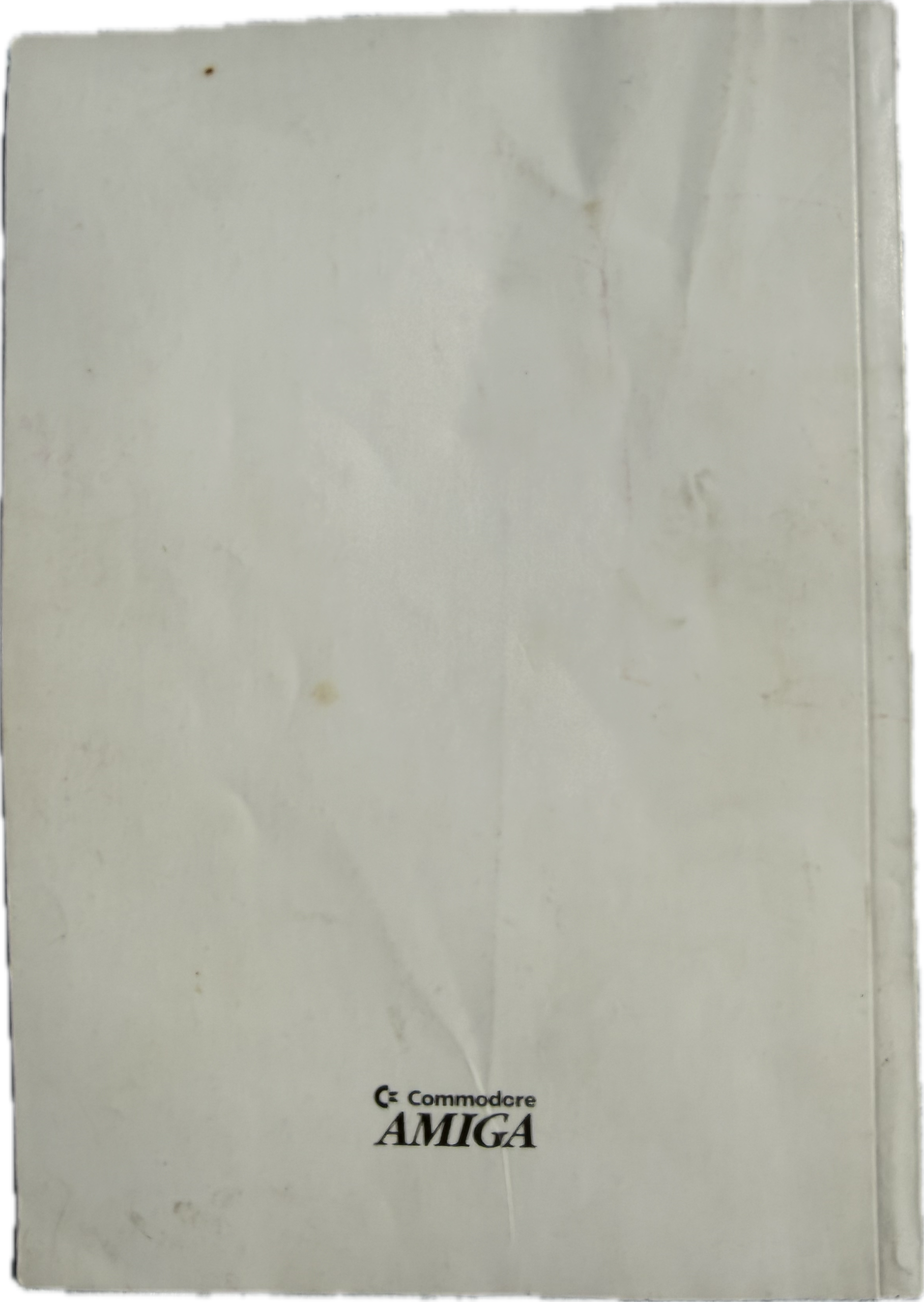 Rear view of Amiga Enhancer manual showing Commodore Amiga logo.